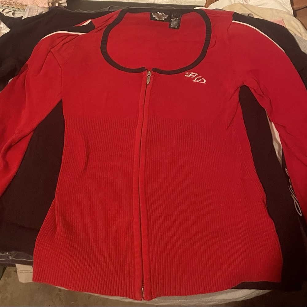 Red, women’s Harley Davidson scoop neck sweater.